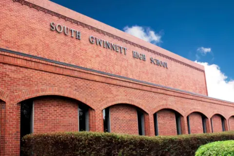 Gun found in student's backpack at Georgia high school, suspect flees campus